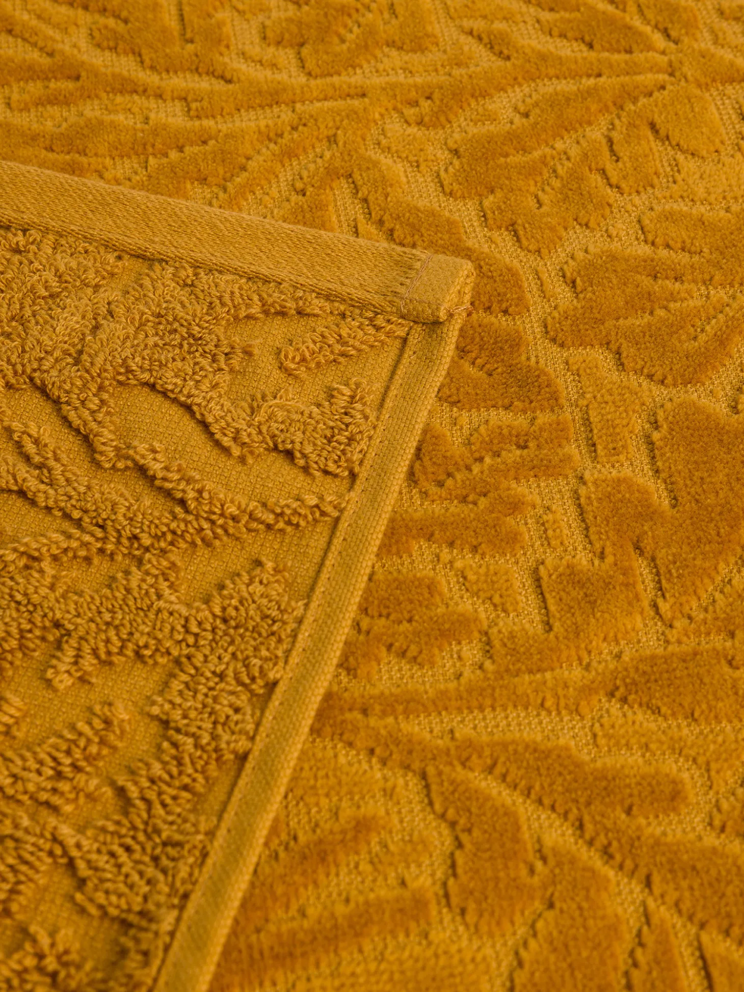 Asciugamano in cotone velour motivo in rilievo