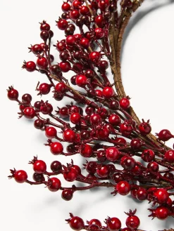 Corona con bacche rosse