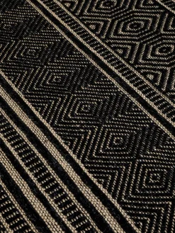 Tappeto in misto cotone motivo geometrico
