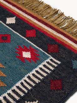 Tappeto stile Navajo con motivo geometrico e frange
