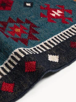 Tappeto stile Navajo con motivo geometrico e frange